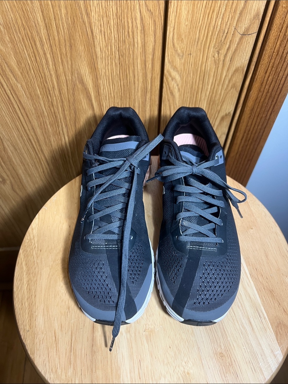 On Running Black Athletic Shoes with Pink Accents